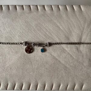 Pulsera Modelo Amuleto con ojo turco azul y medalla floral